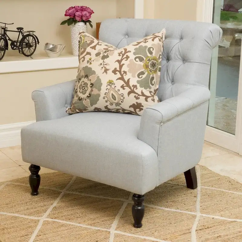 Fauteuil club capitonné