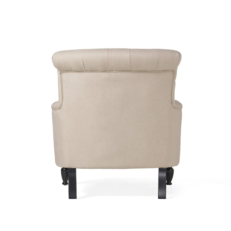 Fauteuil club capitonné