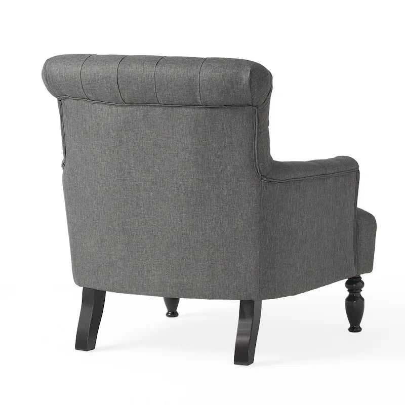 Fauteuil club capitonné