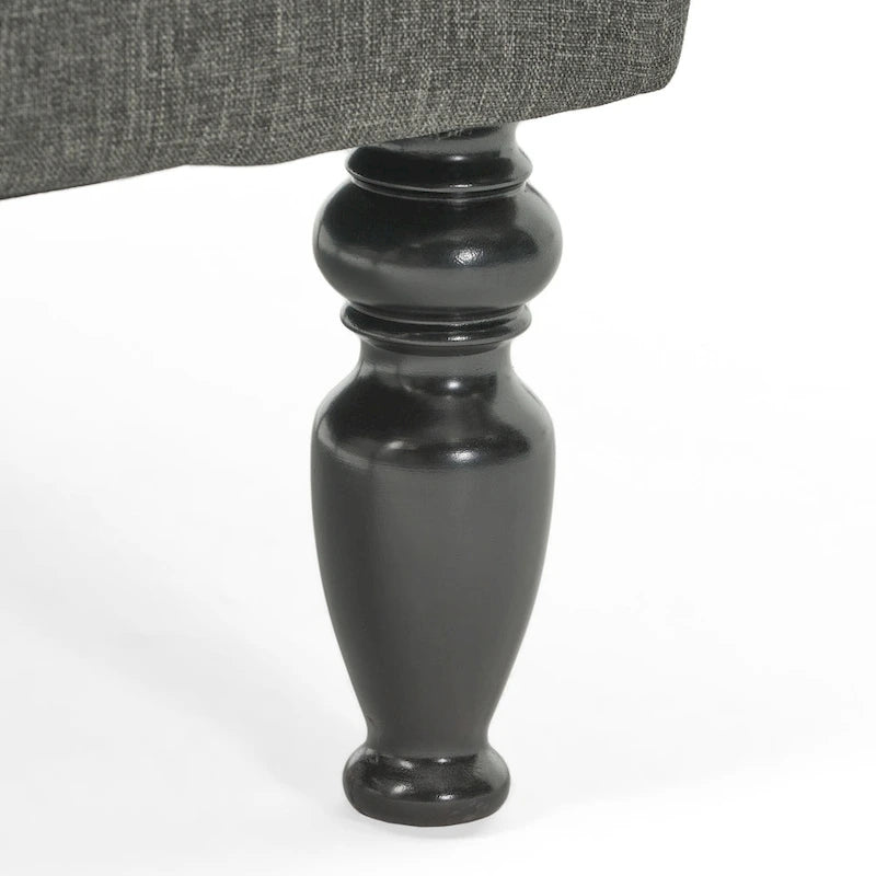 Fauteuil club capitonné